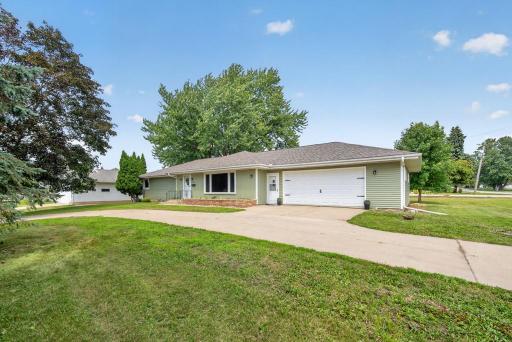 Rest easy knowing you have a new roof and new siding! Enjoy the circle drive, with a flat lot, beautiful curb appeal all less then 5 minutes from shops, restaurants, parks and medical centers.