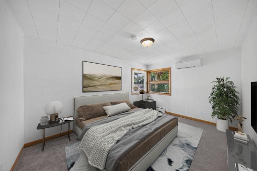 There are some new windows and some new flooring through out the main level. The mini split offers great a/c to provide cool comfortable temperatures. The room has been virtually staged.