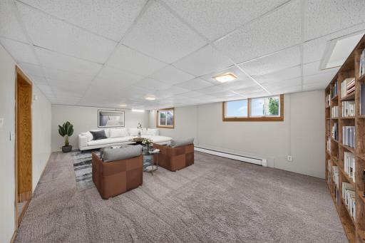 Virtually staged lower level family room! There is so much space in this home...again makes me think of all the options you could do---family room, do you work from home need a large office to meet with clients, or home school & have a classroom?