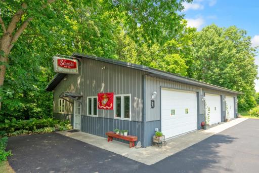 Finished 36x68 Shop with 10 ft. ceilings, 3/4 bath, bar, floor drains and vehicle lift rated 12,000 pounds