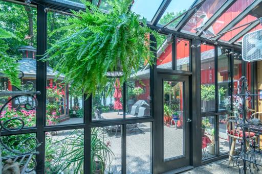 View of the patio from interior of the Greenhouse