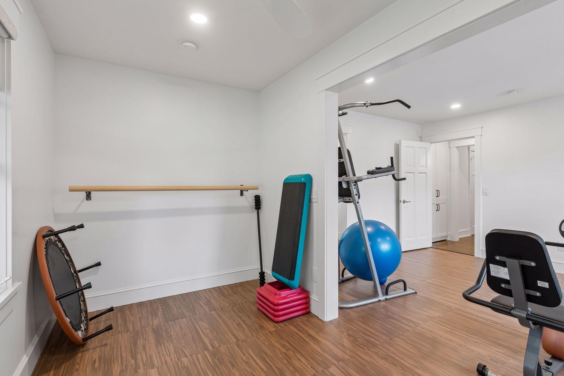 flooring can is not glued and can easily be removed and replaced with carpet to be used as a bedroom or desired space