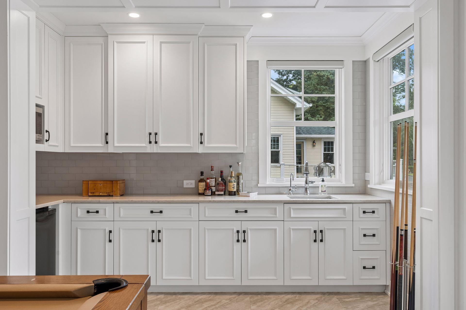 family room area with wet bar and tons of storage