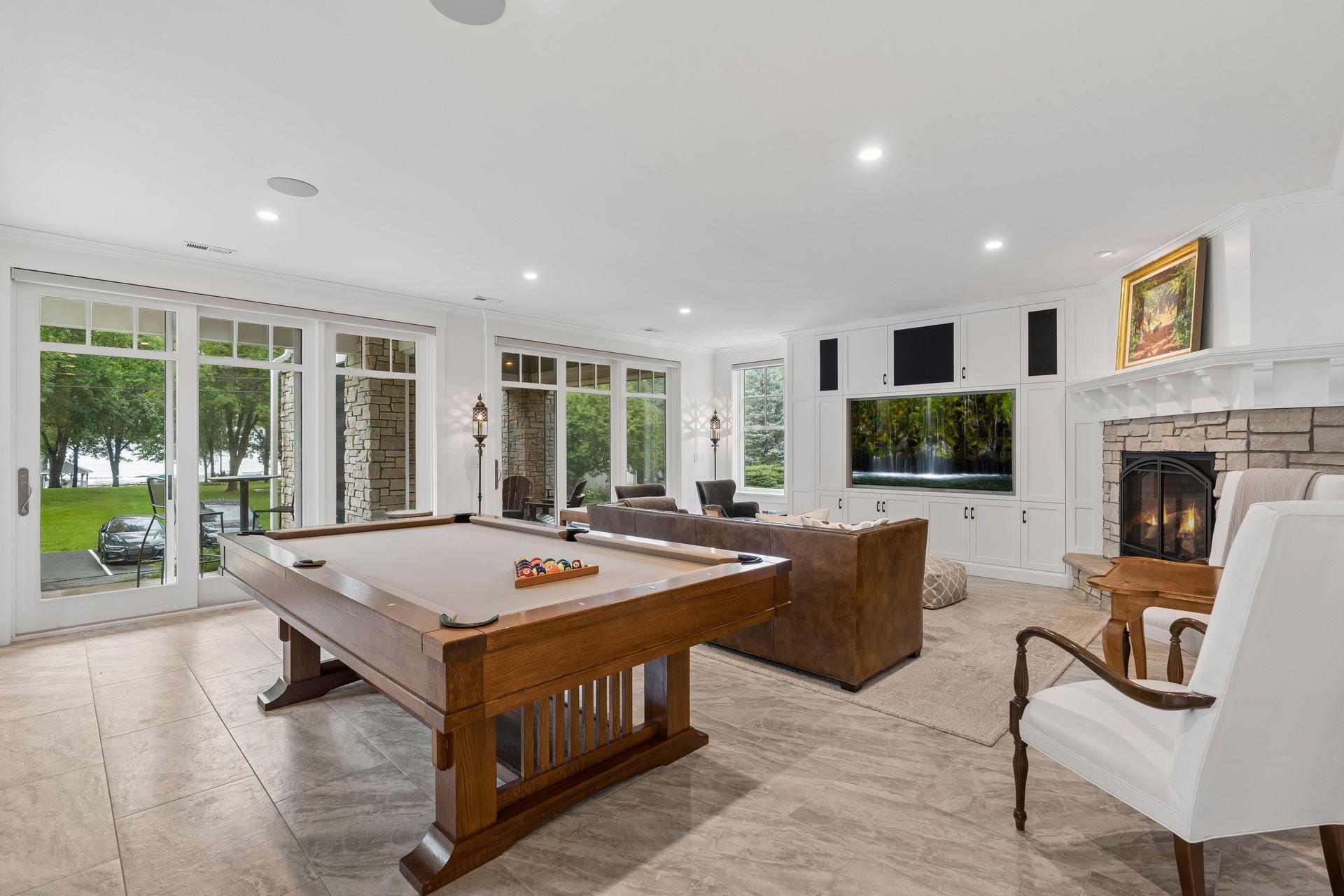 larger family room, heated floors, lake views and wet bar