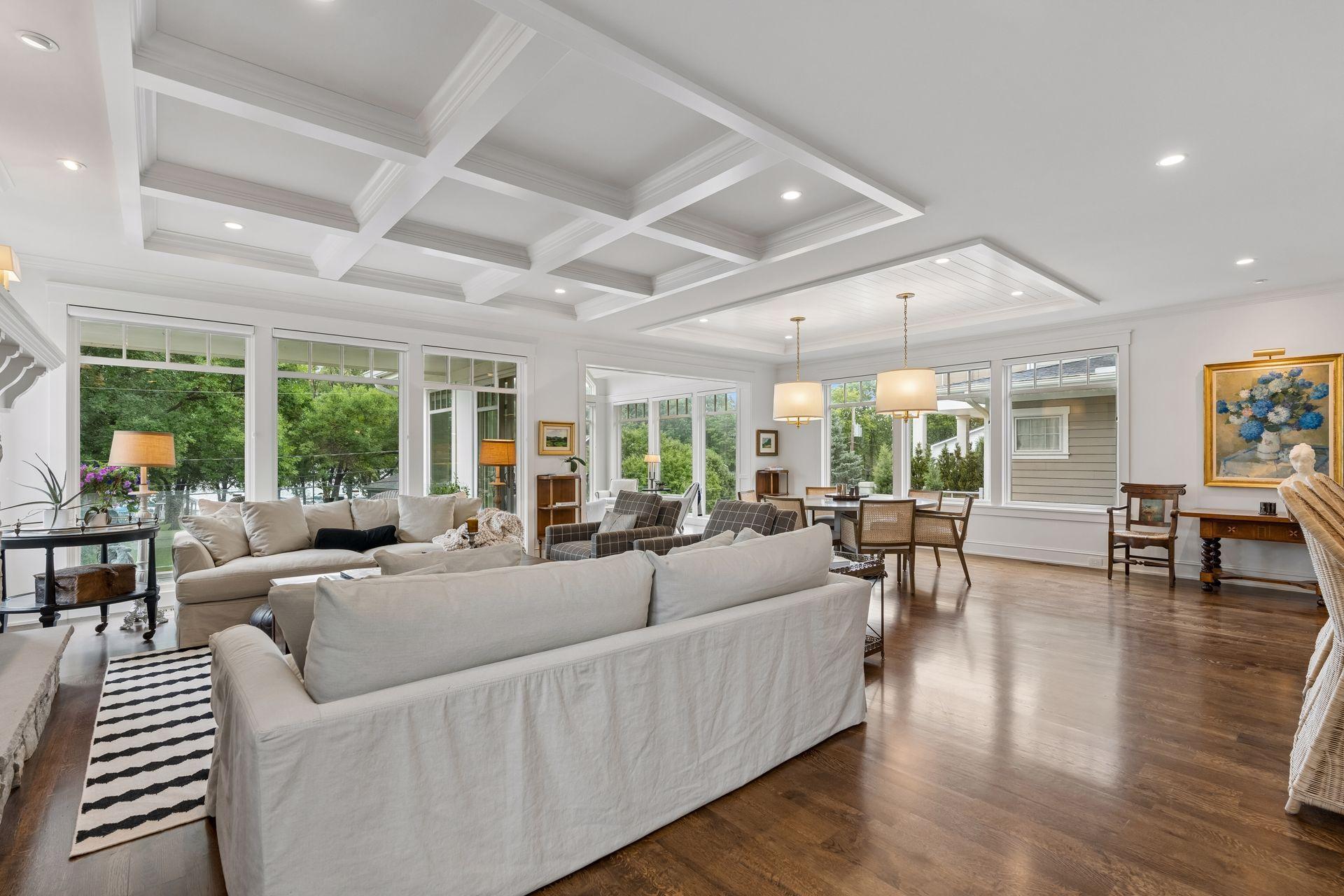 main level living area with site finished oak floors, tons of windows, and open flow