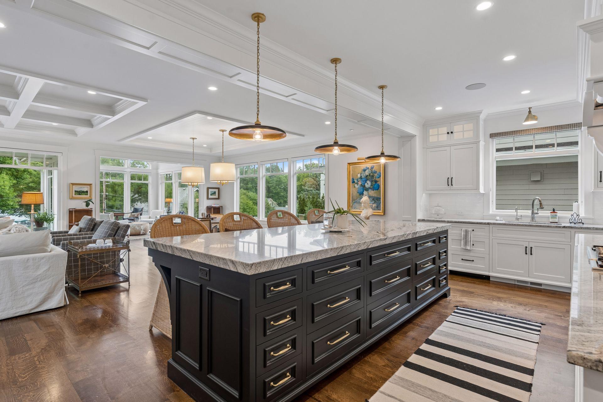 large island, opening to living and dining areas