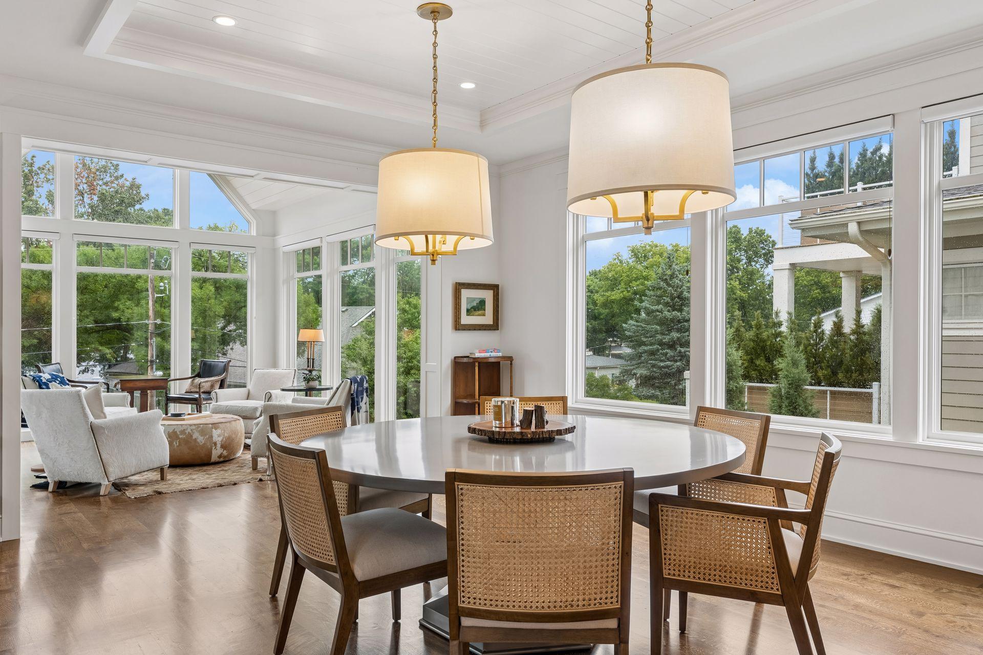 main level dining and sunroom spaces