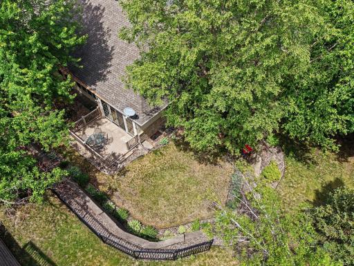 Private backyard view with mature trees, nature, and frequent wildlife sightings.