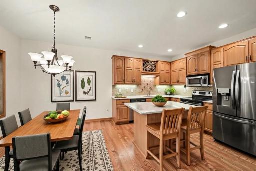 Informal dining area with easy access to the kitchen (virtually staged to show potential)