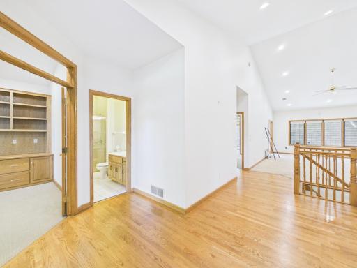 Welcoming entry with access to the vaulted main-level living spaces.