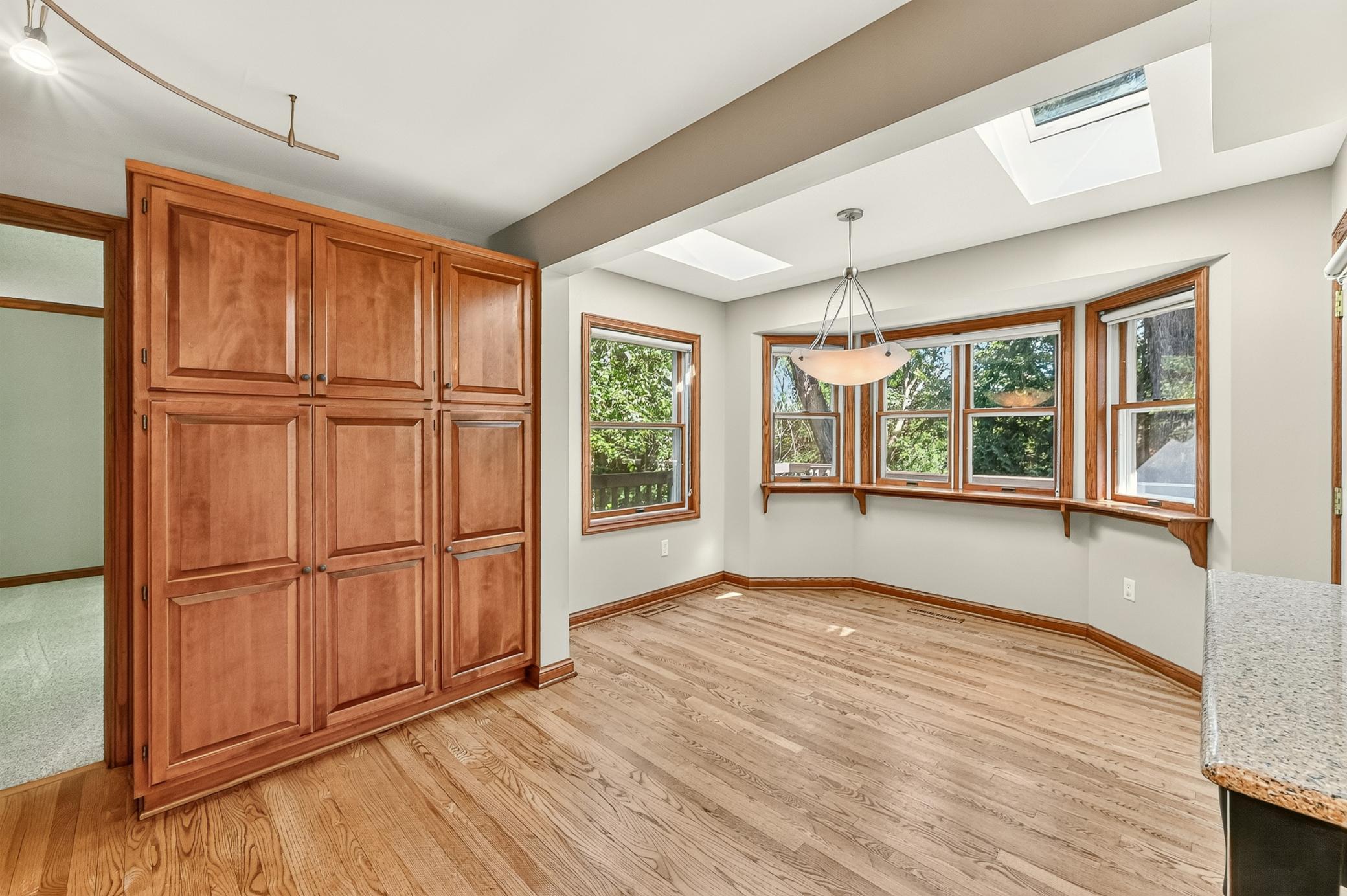 Additional built ins with pull out. Great pantry space.jpg