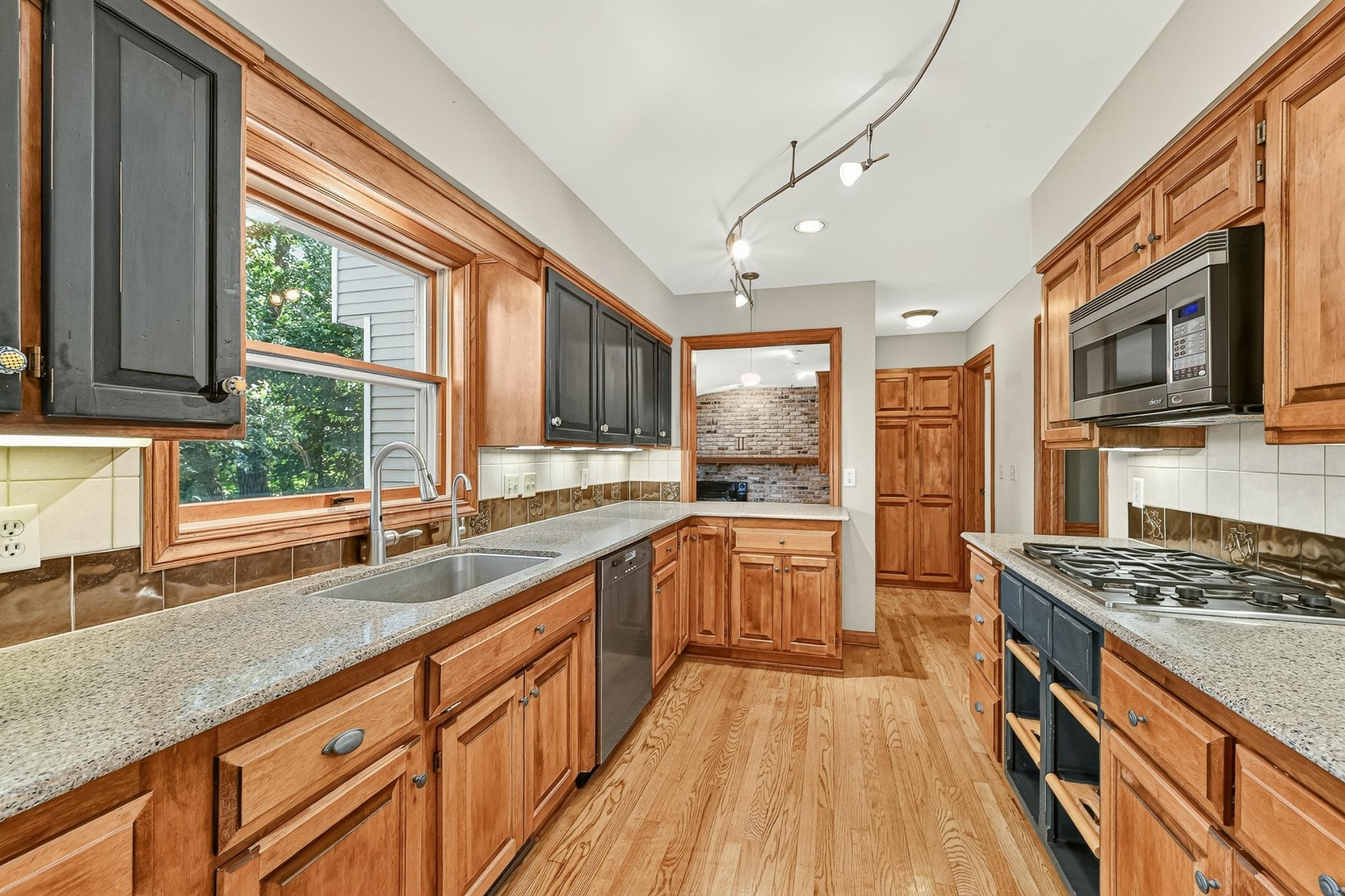 Galley Kitchen, subzero fridge, dacor ovens,