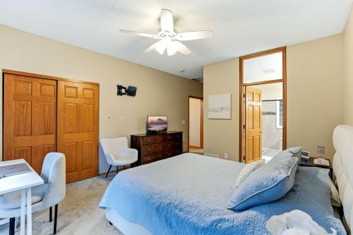 Primary Bedroom with walk-in closet and private bath.