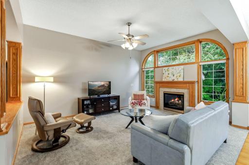 Livingroom with Wall of Windows and Gas Fireplace!