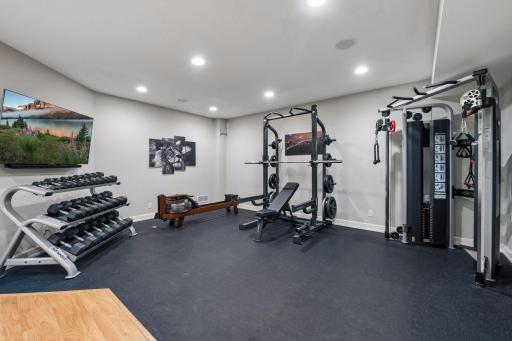 The home gym was completed in 2021 and has cardio space, a barre wall, and plenty of space for machines and free weights.
