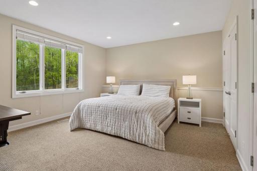 This delightful 5th bedroom (in the lower level) is tucked away from all the action.