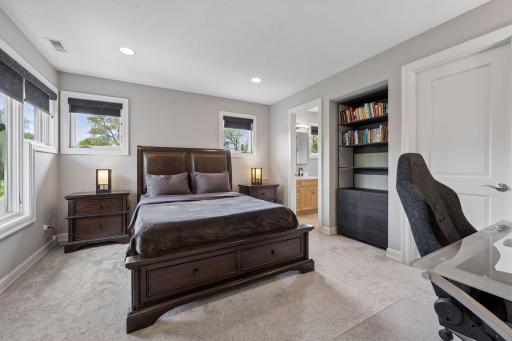 The upper level boasts 3 enormous bedrooms, this one with an en suite bathroom (so it could be used as a 2nd primary suite, if an upper level primary was desired).