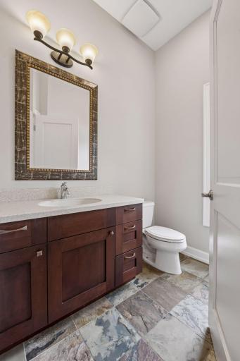 A 2nd powder bathroom completes the main level.
