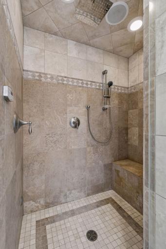A view of the steam shower in the primary bathroom. Not pictured are the TWO walk-in closets, and built in dresser.