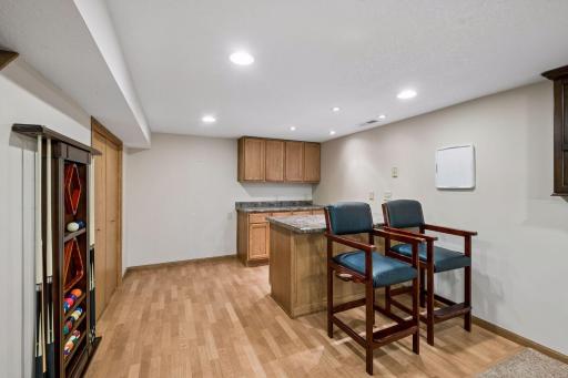 The 2 bar stools can stay if you'd like