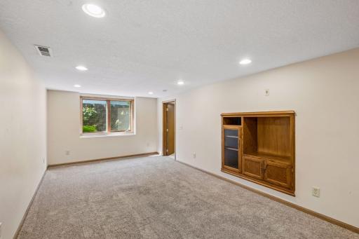 Egress window, could add a bedroom; built in entertainment center