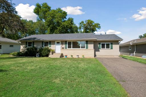 Photo for 702 Madison Street S, Shakopee, MN 55379 - listing #7119659 Bright sunny front yard with full grown shrubs