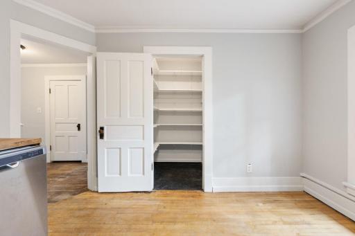Walk-in pantry and ample room for a kitchen table and chairs