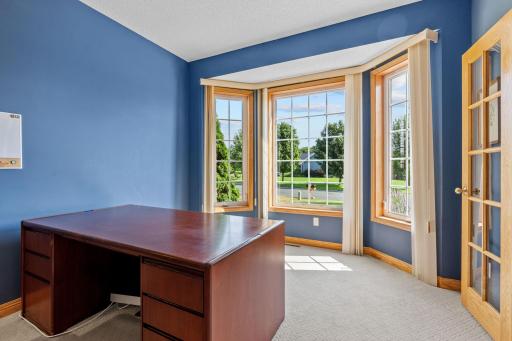 Main Floor Office / Flex Room with Large Windows overlooking the front yard