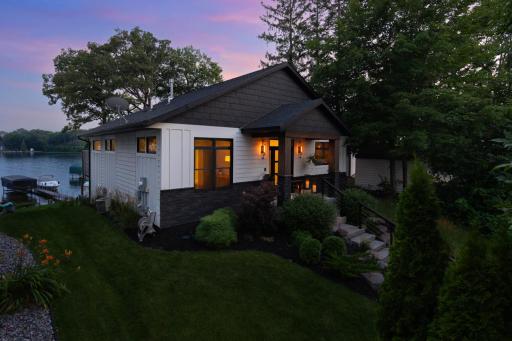 Perfectly nestled along the coveted shores of Lake Minnetonka, this extraordinary waterfront retreat seamlessly blends timeless lake charm with modern luxury.