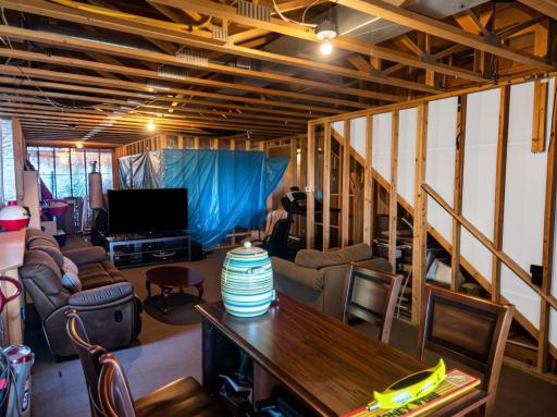 Spacious unfinished basement features in floor heating and set up for endless possibilities.