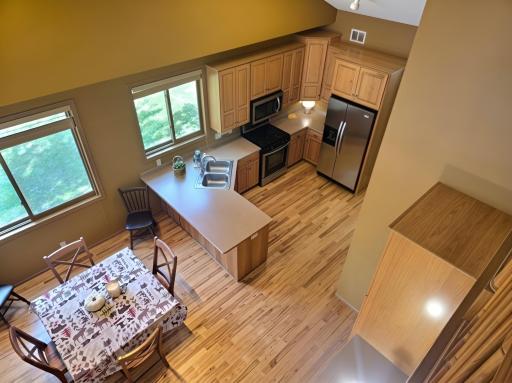 Beautiful hardwood floors flow through the kitchen and into dining room.