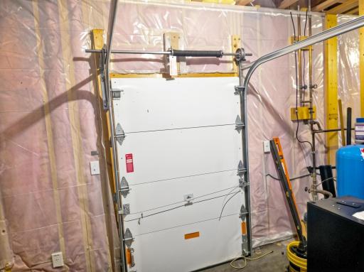 Additional storage under garage is easily accessible through the side sliding door in basement.