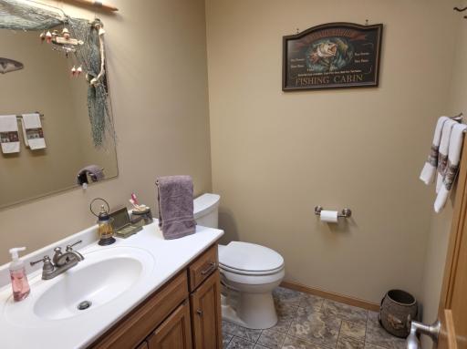 Half bathroom off the kitchen.