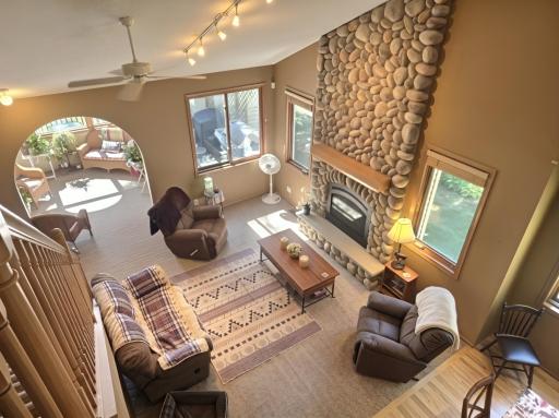 This floor to ceiling fireplace is the center piece of this home and ties everything together.