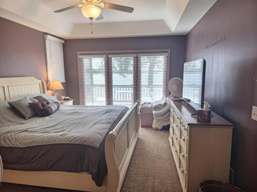 Wake up every morning with breath taking views of Clearwater Lake from the primary suite.