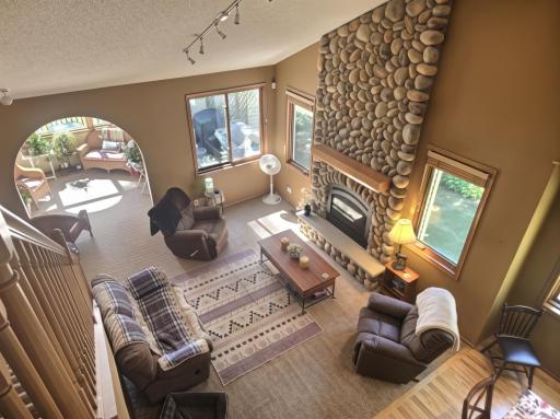 This floor to ceiling fireplace is the center piece of this home and ties everything together.