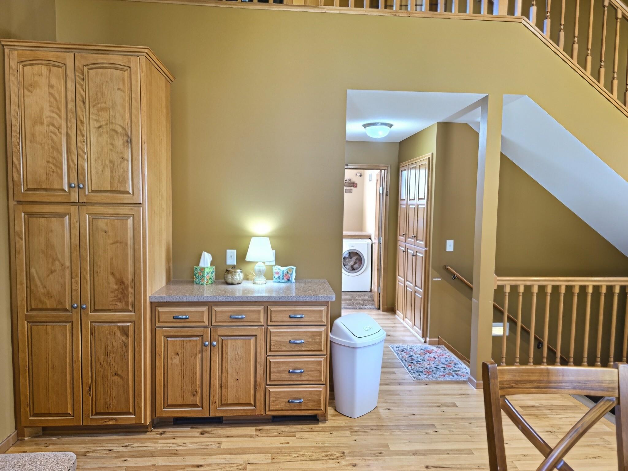 Custom cabinets provide ample storage throughout the home.