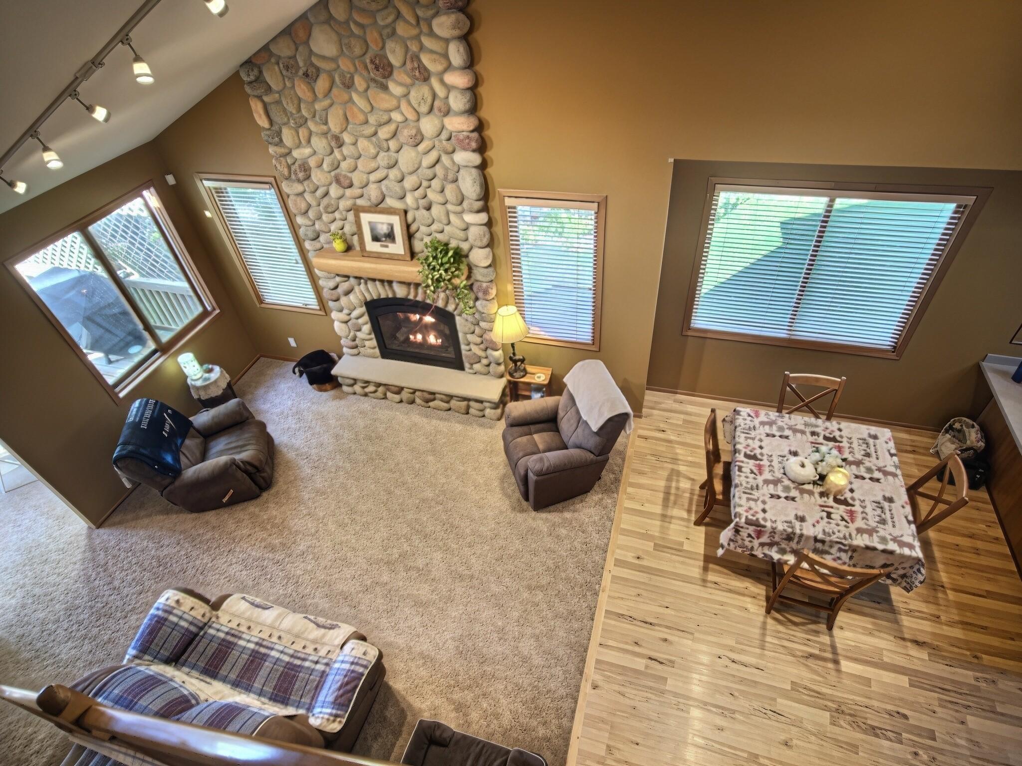 This floor to ceiling fireplace is the center piece of this home and ties everything together.