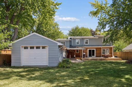 Garage opens to the backyard convenient for your yard tools and lawn mower.