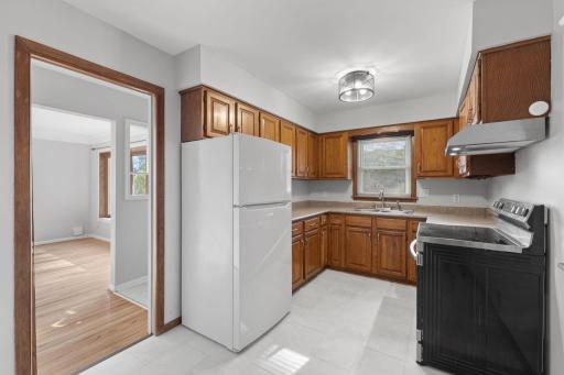 Additional kitchen view showing storage, appliances, and easy flow through the home.