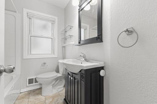 Bathroom detail with bright finishes and classic character.