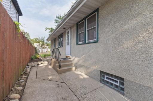 Side entry and walkway offering convenient access around the home.