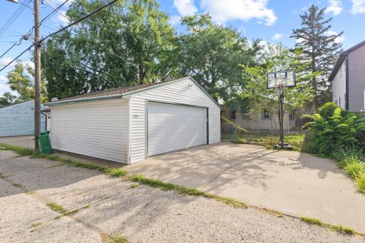 Detached garage and driveway area with useful parking and storage options.