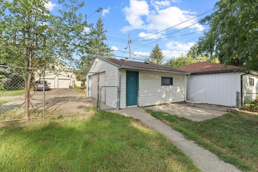 Garage view with alley access and practical off-street parking.