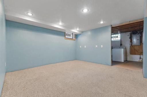 Open lower-level view with room to create the setup that works for you.