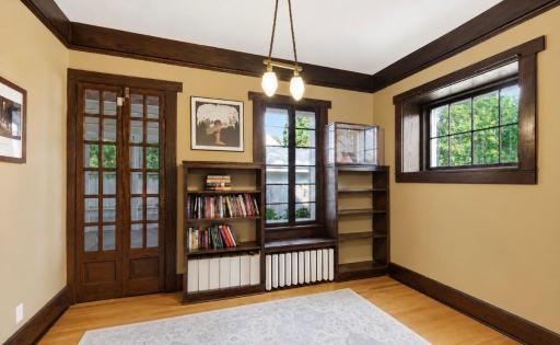 The sitting room is such a great addition to the living room. Access to the porch through the door.