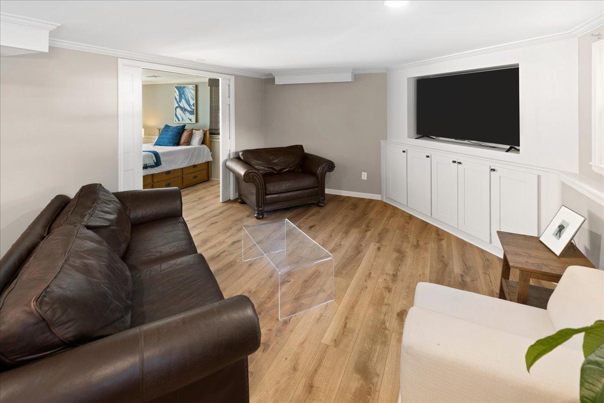 The lower level is ready for gaming or the movie night!