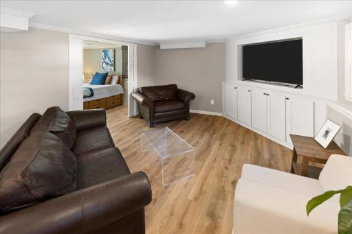 The lower level is ready for gaming or the movie night!