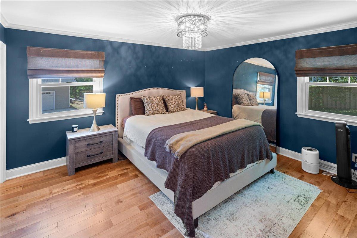 Primary bedroom on the upper level features great built-in cabinetry and private 3/4 bathroom.