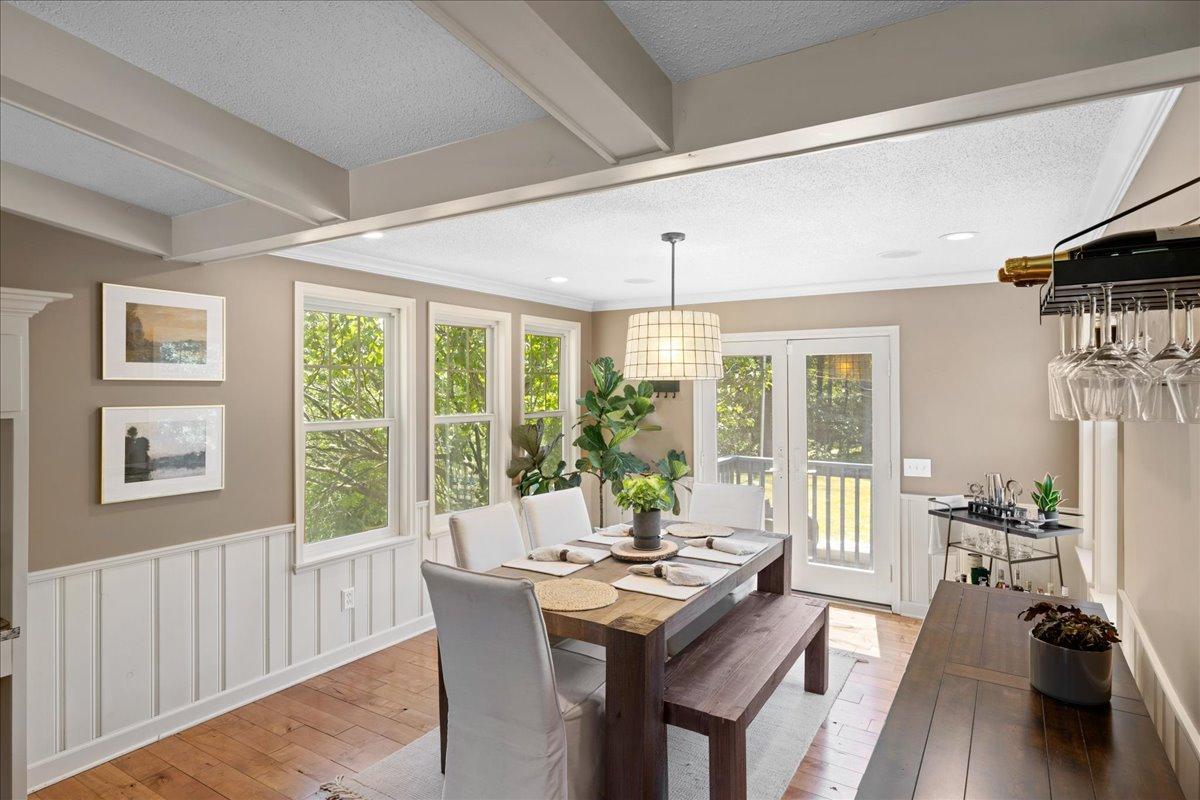 Sunny dining room area with easy access to the backyard through the double doors.